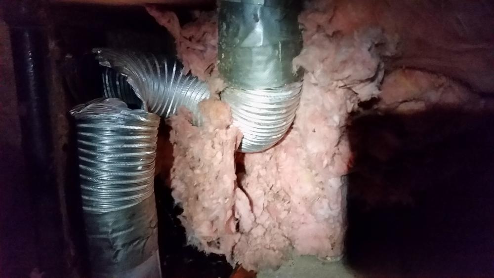 Damaged dryer vent due to improper venting and an incorrect installation.