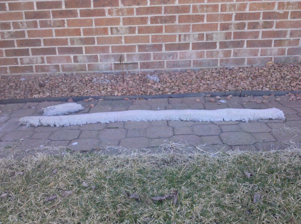 A continuous length of compacted dryer lint that was removed from a dryer vent line in Northville.