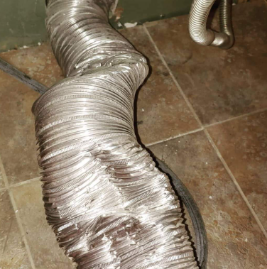 Oh no, no, no, this semi-rigid can easily get crushed, especially when you put the dryer back in its desired place. This can reduce its effectiveness by more than half in some cases, AND it’s a HUGE fire hazard….