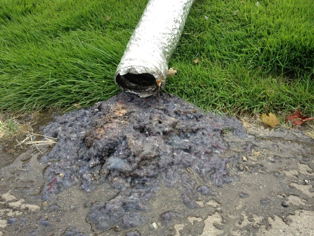 Wet lint and water in foil dryer vent in Detroit.