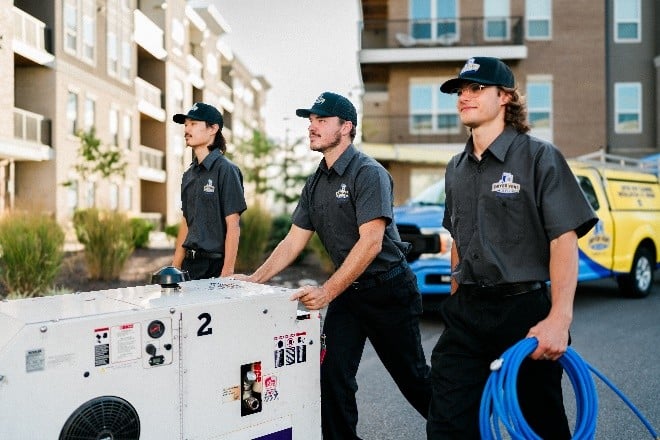 A Dryer Vent Wizard professional has arrived to perform multi-unit dryer vent cleaning 